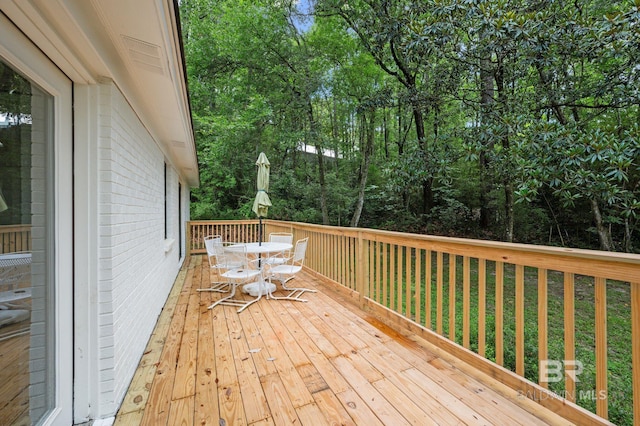 169 Buena Vista Dr, Daphne, AL 36526 - wooden terrace with outdoor dining area