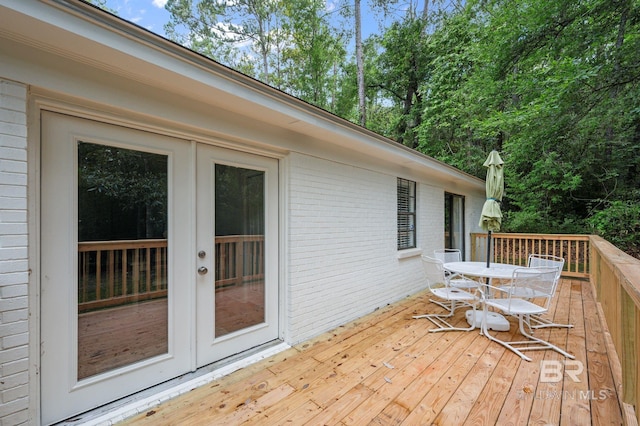 169 Buena Vista Dr, Daphne, AL 36526 - wooden deck with outdoor dining space and french doors