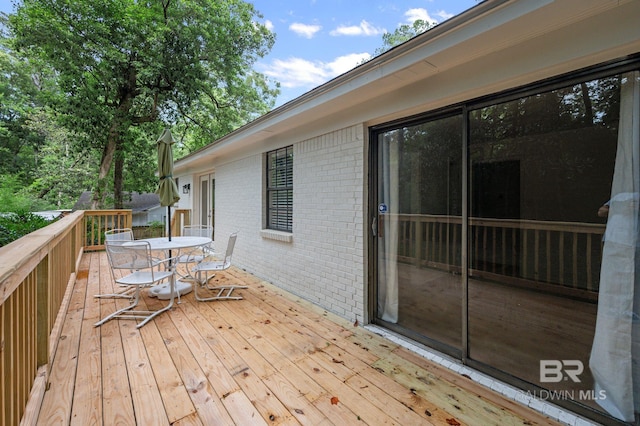 169 Buena Vista Dr, Daphne, AL 36526 - wooden terrace with outdoor dining space