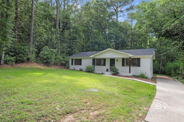 169 Buena Vista Dr, Daphne, AL 36526 - ranch-style house featuring a front yard, driveway, and brick siding