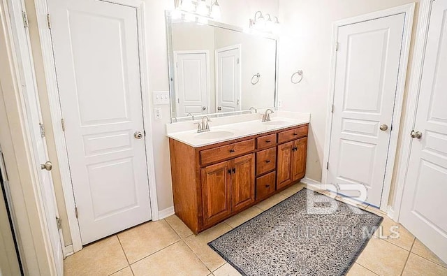 bathroom with vanity and tile patterned floors