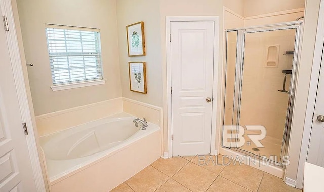 bathroom featuring independent shower and bath and tile patterned floors