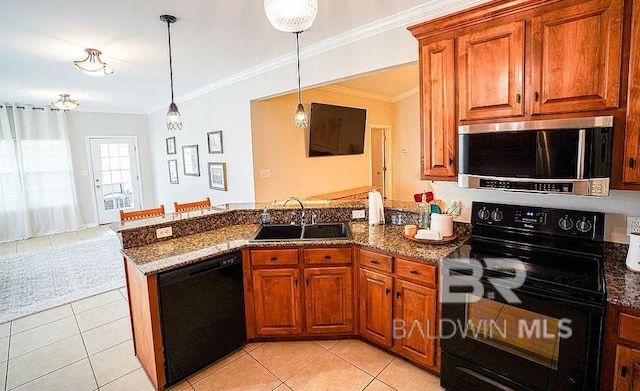 kitchen with black appliances, kitchen peninsula, sink, dark stone countertops, and light tile patterned flooring