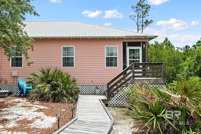 5601 State Highway 180 Unit 2802, Gulf Shores, AL 36535 - back of house with metal roof