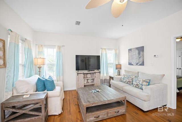 5601 State Highway 180 Unit 2802, Gulf Shores, AL 36535 - living room with wood finished floors, baseboards, and ceiling fan