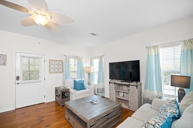5601 State Highway 180 Unit 2802, Gulf Shores, AL 36535 - living area with plenty of natural light, wood finished floors, and a ceiling fan