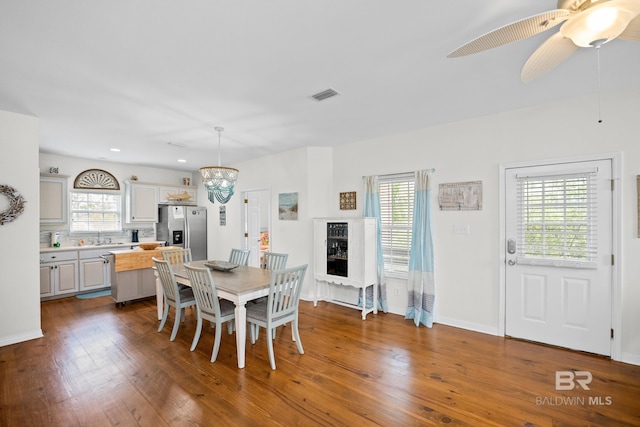5601 State Highway 180 Unit 2802, Gulf Shores, AL 36535 - dining area featuring healthy amount of natural light, dark wood-style floors, recessed lighting, ceiling fan, and baseboards
