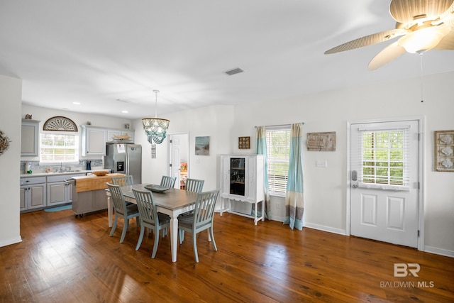 5601 State Highway 180 Unit 2802, Gulf Shores, AL 36535 - dining space with dark wood finished floors, a ceiling fan, baseboards, and recessed lighting