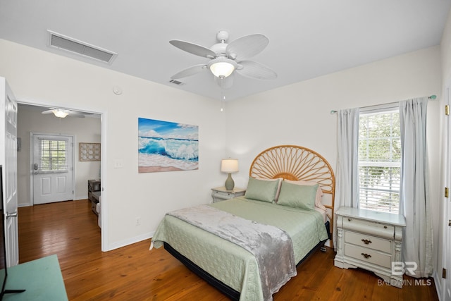 5601 State Highway 180 Unit 2802, Gulf Shores, AL 36535 - bedroom with wood finished floors, ceiling fan, and baseboards