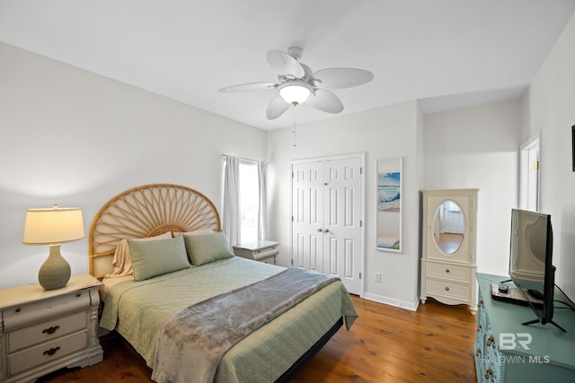 5601 State Highway 180 Unit 2802, Gulf Shores, AL 36535 - bedroom featuring wood finished floors, a closet, baseboards, and a ceiling fan