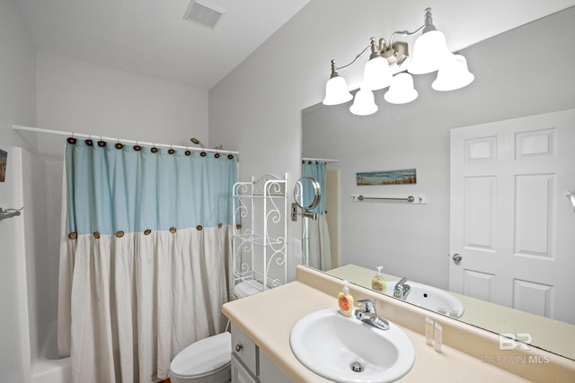 5601 State Highway 180 Unit 2802, Gulf Shores, AL 36535 - full bath featuring toilet, vanity, and a chandelier