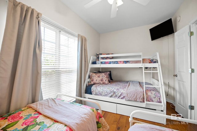 5601 State Highway 180 Unit 2802, Gulf Shores, AL 36535 - bedroom featuring wood finished floors and a ceiling fan