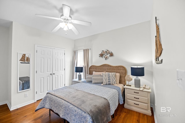 5601 State Highway 180 Unit 2802, Gulf Shores, AL 36535 - bedroom featuring a closet, wood finished floors, baseboards, and a ceiling fan