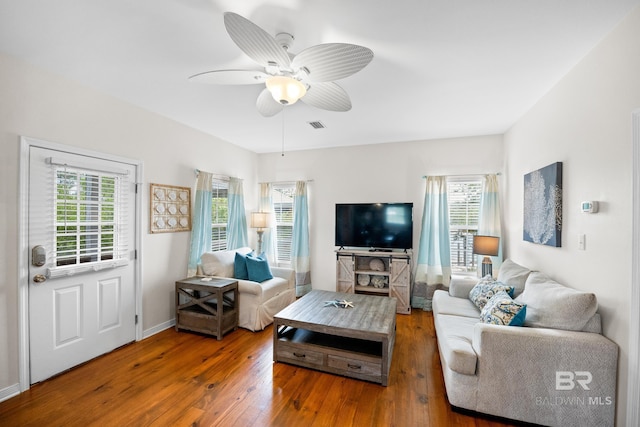 5601 State Highway 180 Unit 2802, Gulf Shores, AL 36535 - living area featuring hardwood / wood-style flooring, plenty of natural light, and a ceiling fan