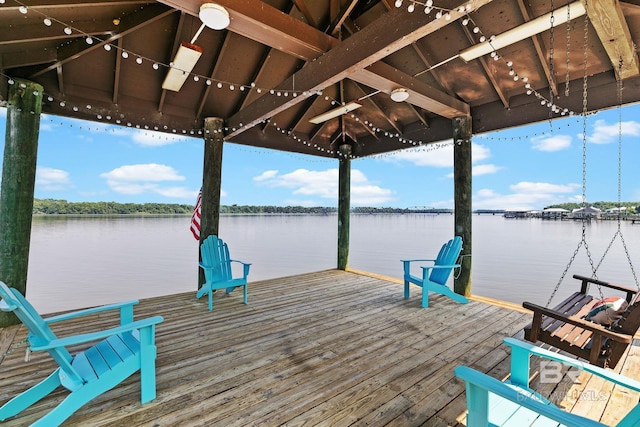 dock area featuring a gazebo and a water view