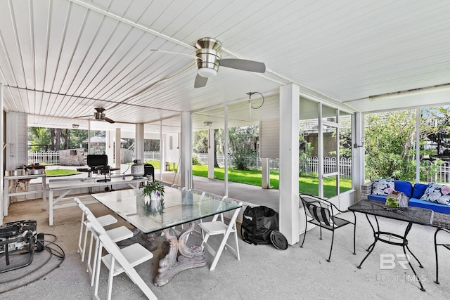 sunroom / solarium with ceiling fan