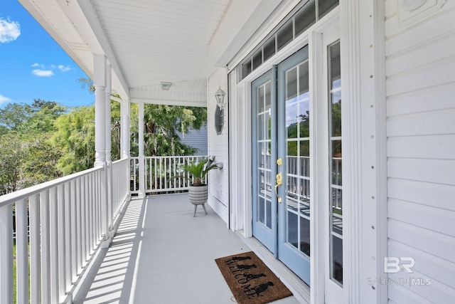 balcony featuring french doors