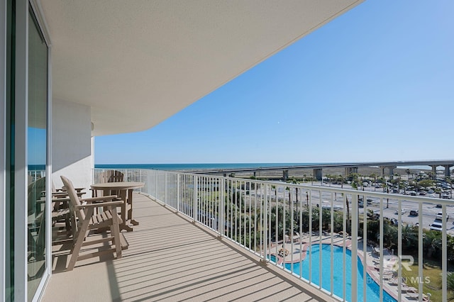 28103 Perdido Beach Blvd Unit B 516, Orange Beach, AL 36561 - balcony featuring view of pool area and a water view