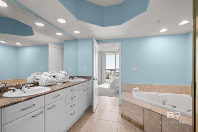 28103 Perdido Beach Blvd Unit B 516, Orange Beach, AL 36561 - ensuite bathroom with double vanity, a bath, tile patterned flooring, and recessed lighting