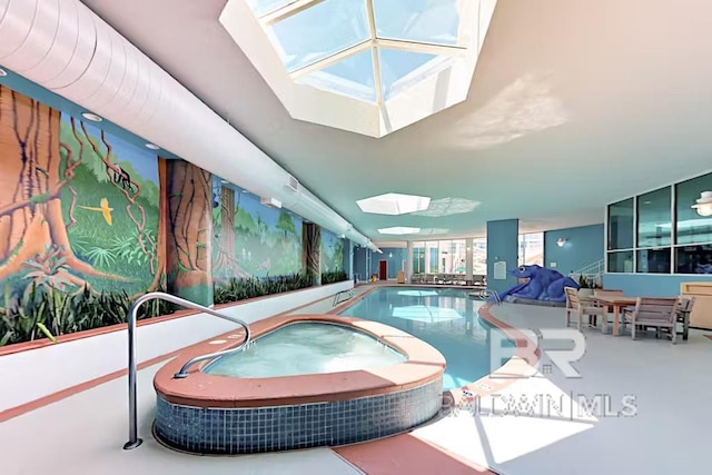 28103 Perdido Beach Blvd Unit B 516, Orange Beach, AL 36561 - view of swimming pool with a skylight and a hot tub