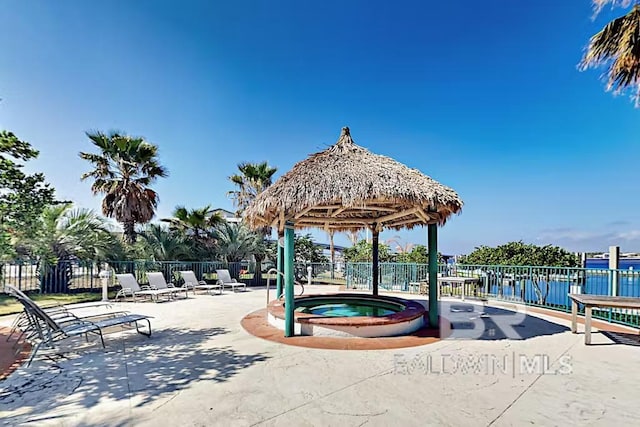 28103 Perdido Beach Blvd Unit B 516, Orange Beach, AL 36561 - surrounding community featuring a hot tub, a gazebo, and a patio area