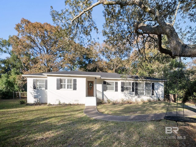 single story home featuring a front lawn