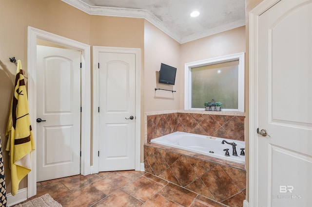 bathroom with a relaxing tiled tub and ornamental molding