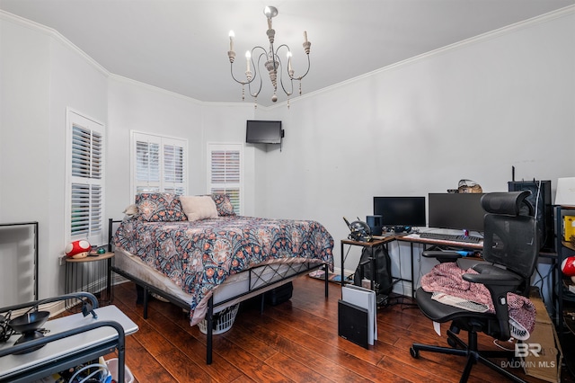 bedroom featuring a chandelier, dark hardwood / wood-style floors, and ornamental molding