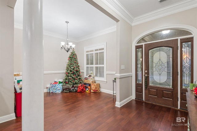 3340 Deer Track Dr, Semmes, AL 36575 - foyer entrance featuring wood finished floors, crown molding, and a chandelier