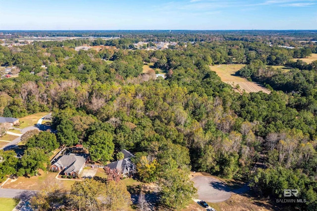 3340 Deer Track Dr, Semmes, AL 36575 - aerial view of property and surrounding area featuring a heavily wooded area