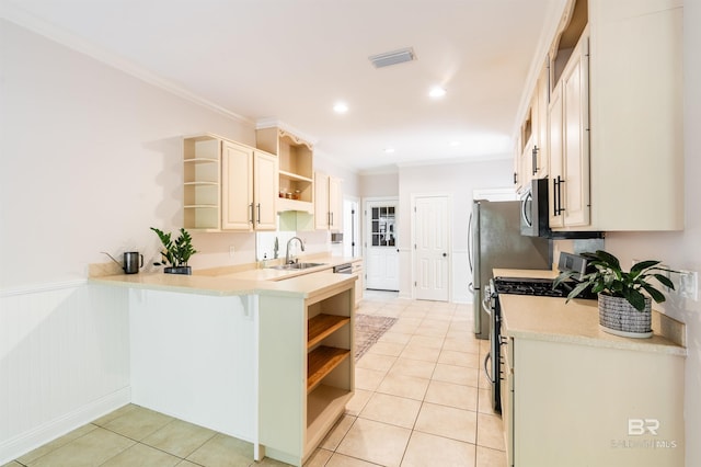 kitchen with light tile patterned flooring, sink, ornamental molding, kitchen peninsula, and stainless steel appliances