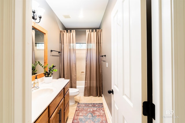 full bathroom with tile patterned flooring, vanity, toilet, and shower / bathtub combination with curtain