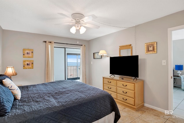 bedroom featuring a textured ceiling, access to outside, light tile patterned floors, and ceiling fan