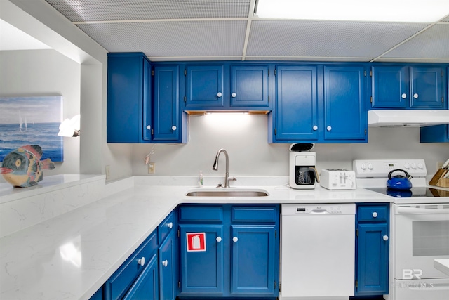 kitchen featuring white appliances, blue cabinetry, and sink