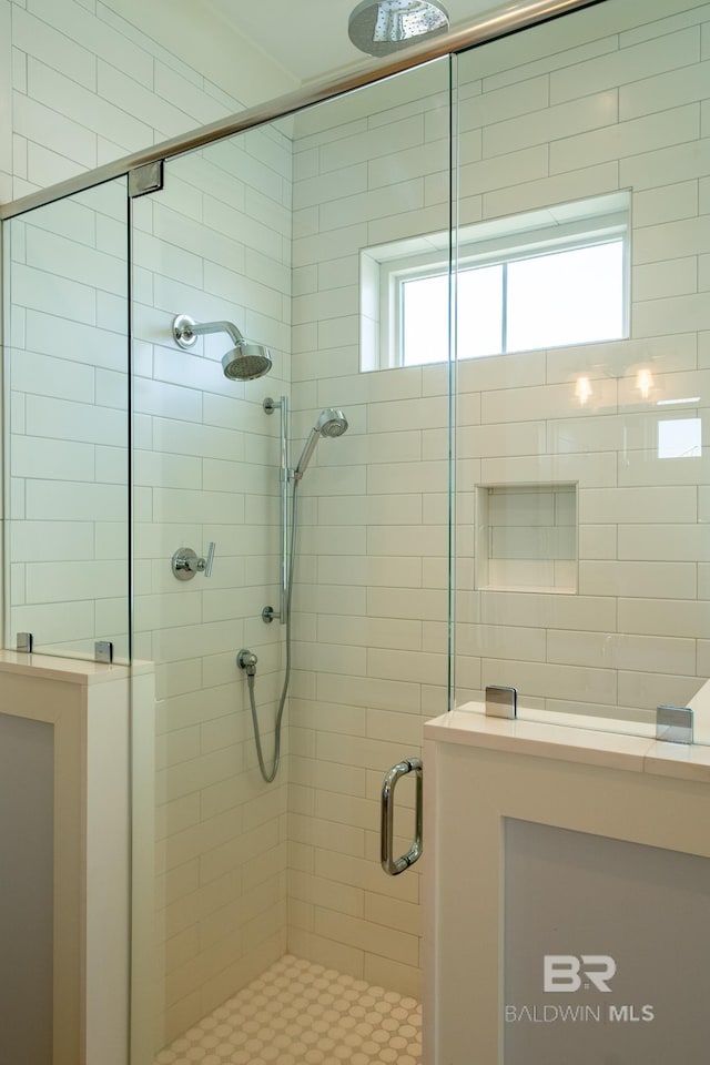 full bathroom featuring a stall shower