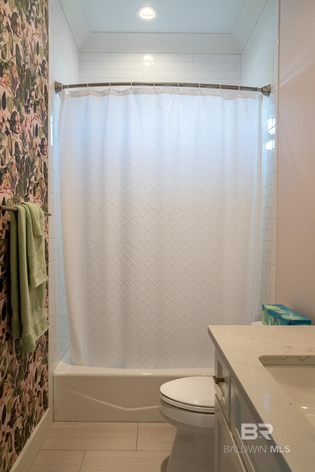 bathroom with toilet, shower / tub combo, tile patterned floors, and vanity