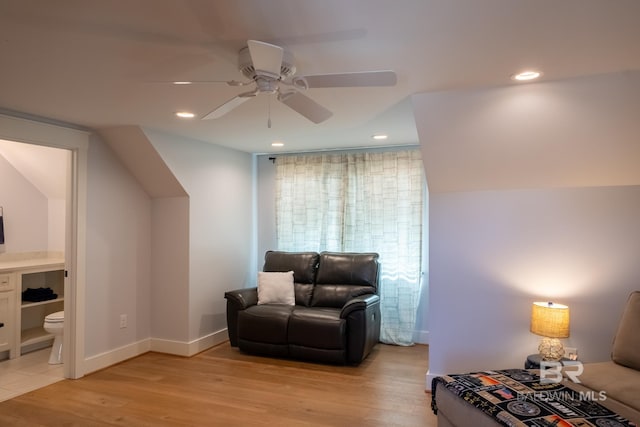 living area with a ceiling fan, light wood-type flooring, baseboards, and recessed lighting