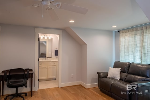 living area with a ceiling fan, light wood-type flooring, baseboards, and recessed lighting