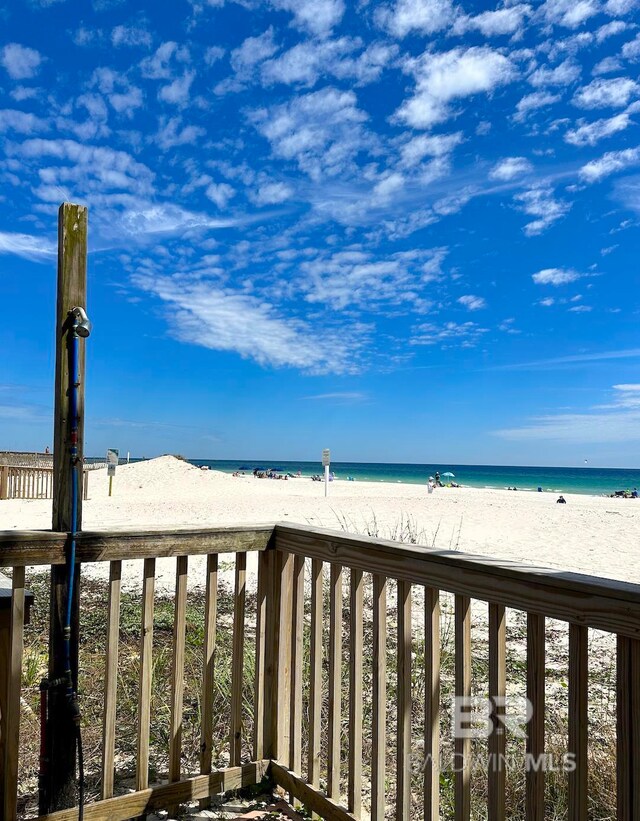 view of water feature with a beach view