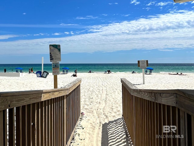 view of water feature with a beach view