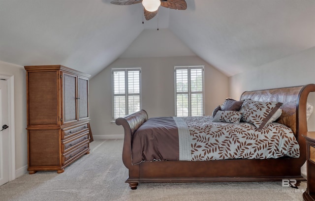 4209 Antigua Ct, Orange Beach, AL 36561 - bedroom with a ceiling fan, baseboards, lofted ceiling, and light colored carpet