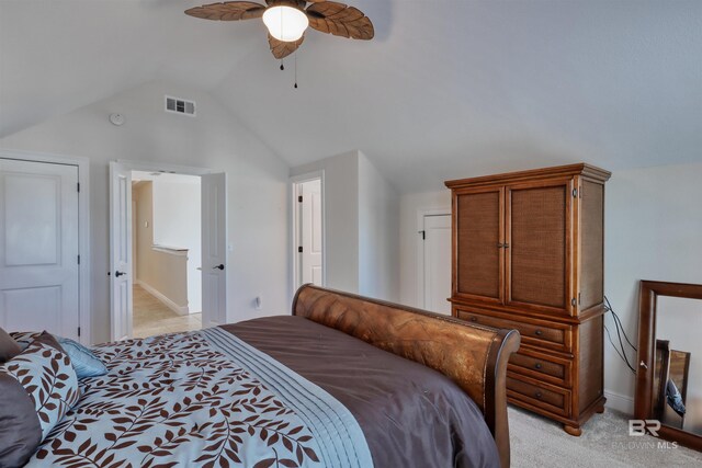 4209 Antigua Ct, Orange Beach, AL 36561 - bedroom with a ceiling fan, light carpet, vaulted ceiling, and visible vents