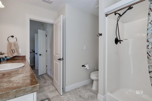 4209 Antigua Ct, Orange Beach, AL 36561 - bathroom with baseboards, a shower with shower curtain, toilet, and vanity