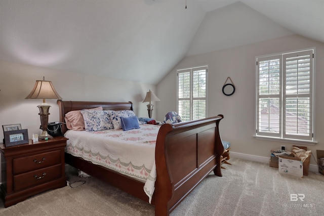 4209 Antigua Ct, Orange Beach, AL 36561 - carpeted bedroom with baseboards and vaulted ceiling