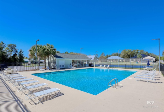 4209 Antigua Ct, Orange Beach, AL 36561 - pool featuring a patio area and fence