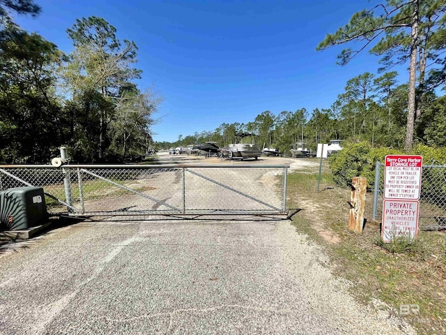 4209 Antigua Ct, Orange Beach, AL 36561 - view of gate with fence