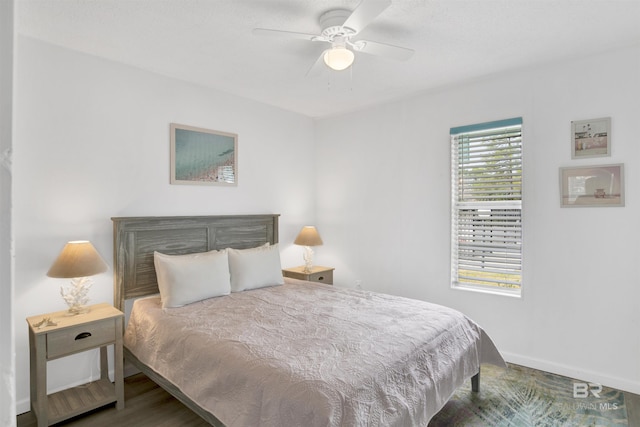 325 E 22nd Ave Unit 8, Gulf Shores, AL 36542 - bedroom with baseboards and a ceiling fan