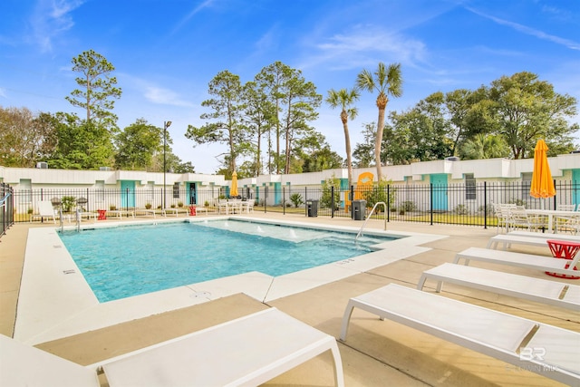 325 E 22nd Ave Unit 8, Gulf Shores, AL 36542 - community pool featuring a patio