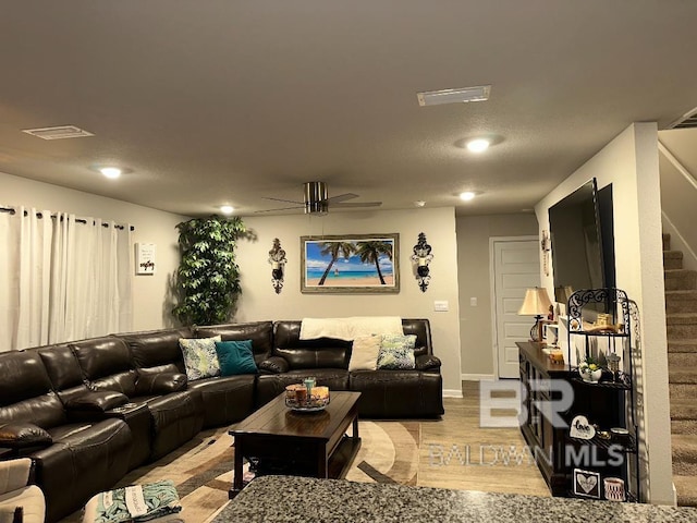 living room featuring recessed lighting, visible vents, stairway, a ceiling fan, and light wood-type flooring