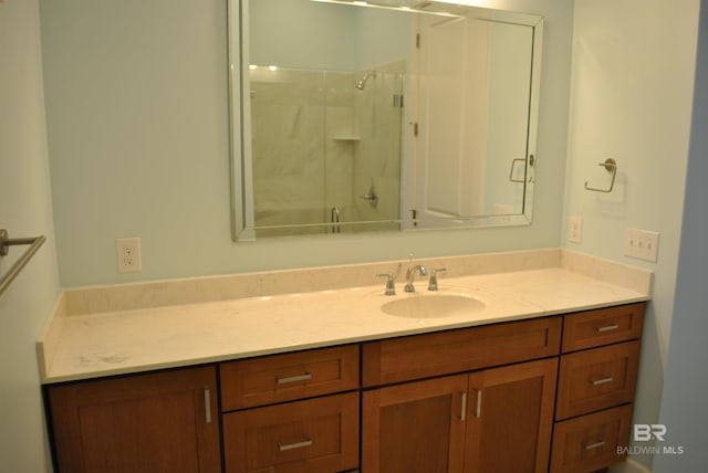 bathroom featuring vanity and walk in shower